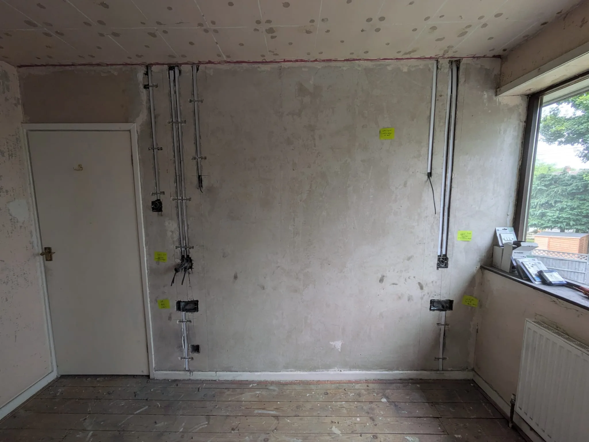 Home rewire in progress showing chased walls and new cabling