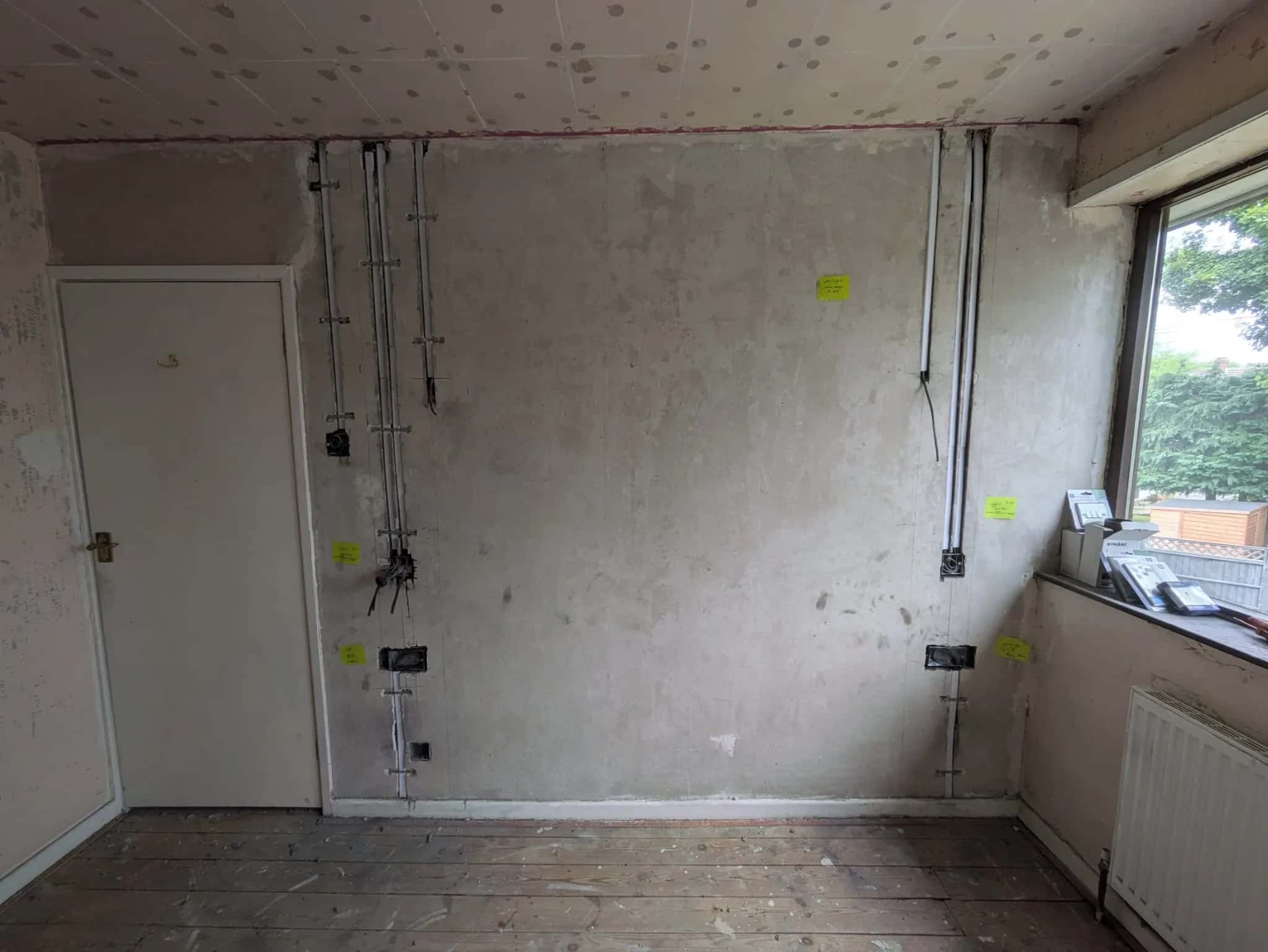 Home rewire in progress showing chased walls and new cabling